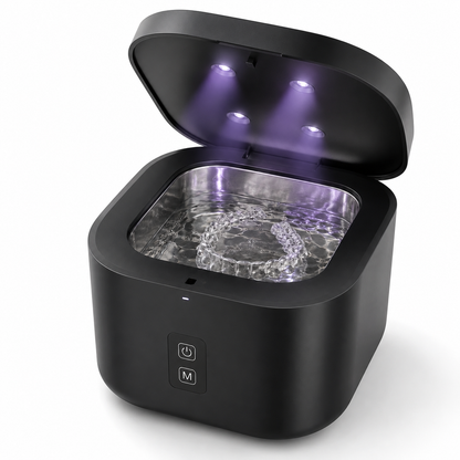Black U-Brightwave ultrasonic cleaner with the lid open, showing a clear aligner tray submerged in water inside the stainless steel basin.